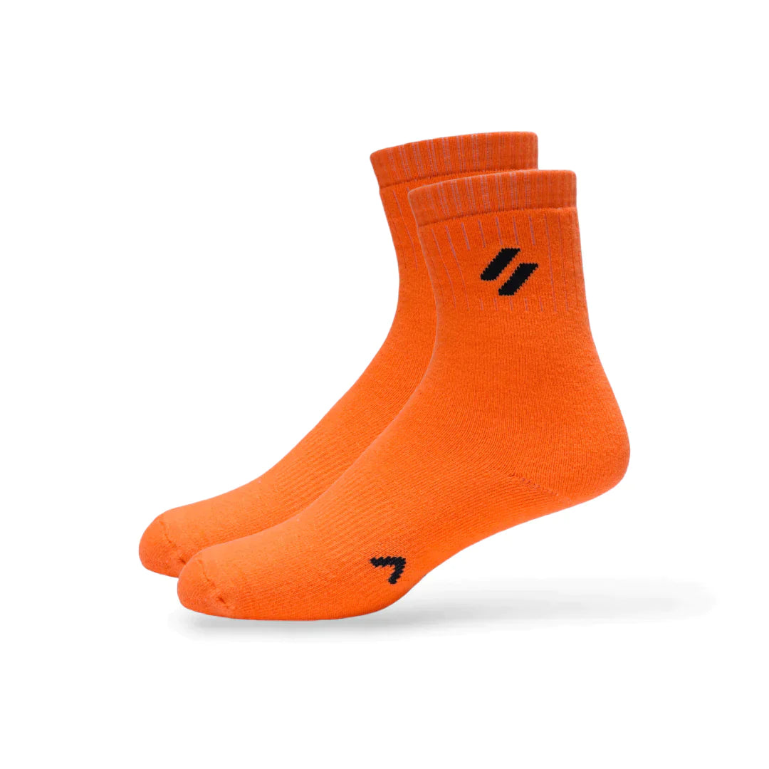 Neon Orange Side view of women’s crew-length sports socks – pack of 2 – showing arch support and breathable mesh panel