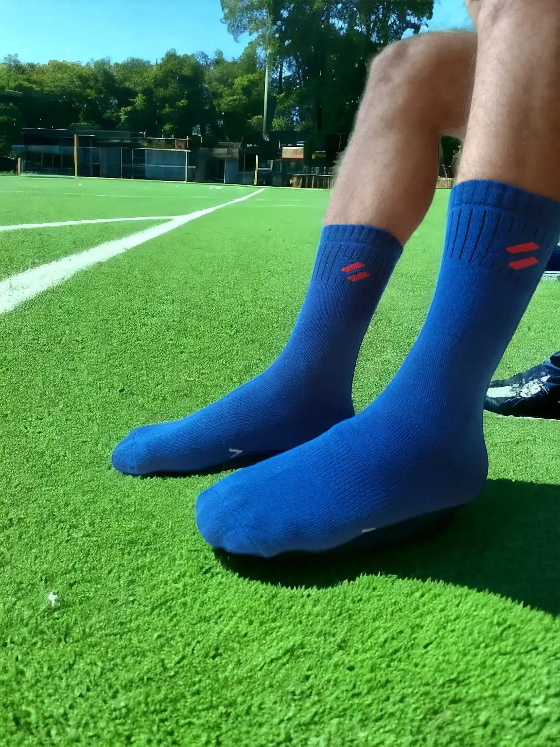 Blue cre socks for sports on athletes feet