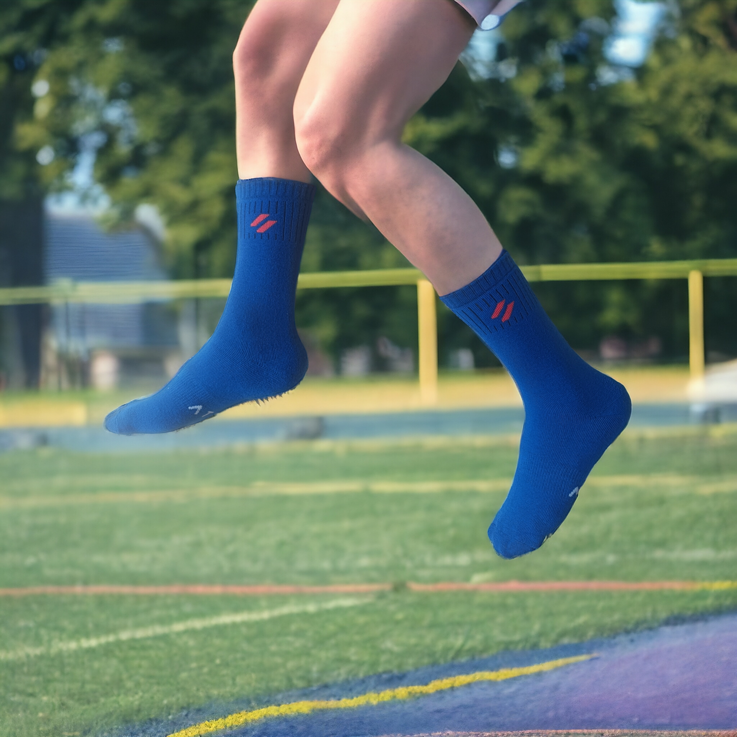 Athlete in blue ATHL sports socks for unparalled comfort