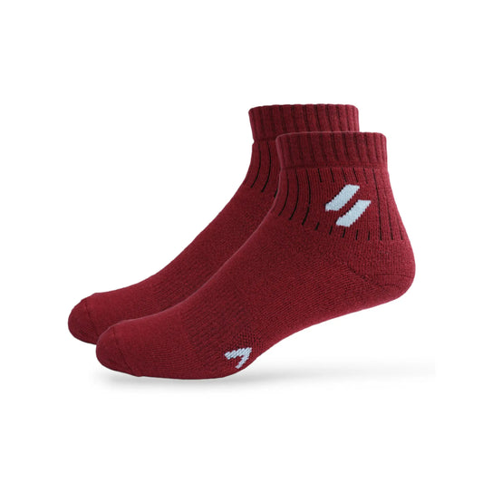 A pair of red sports performance ankle socks with a visible logo on the side.
