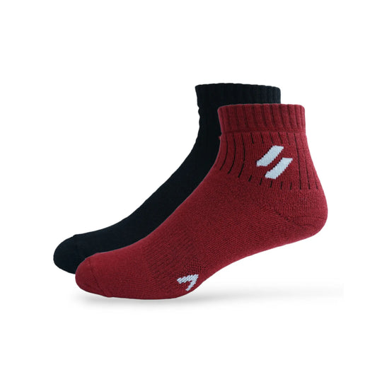 A pair of red sports performance socks with a white logo on the side, designed for ankle length.